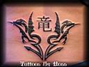 tribal twin dragon tattoo.jpg